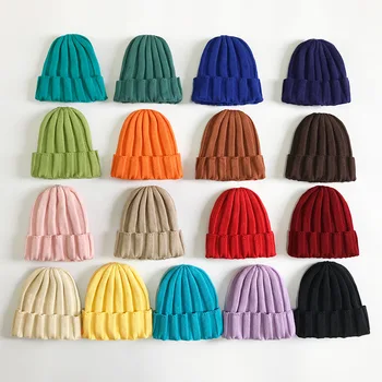 Нова вязаная капачка Модни однотонная есенно-зимна топла вълнена шапка За жени и мъже, Ветроупорен Защитни слушалки Възли шапки TG0167